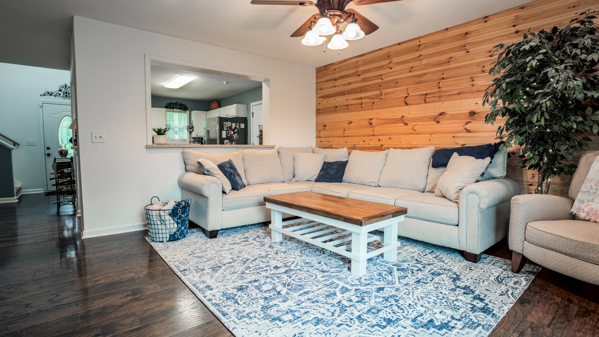 7993 Shoals Branch Road Primm Springs, TN 38476 - Photo 10 of 25 a living room with furniture and a wooden floor