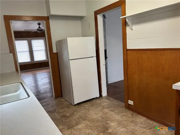 a view of walk in closet with window