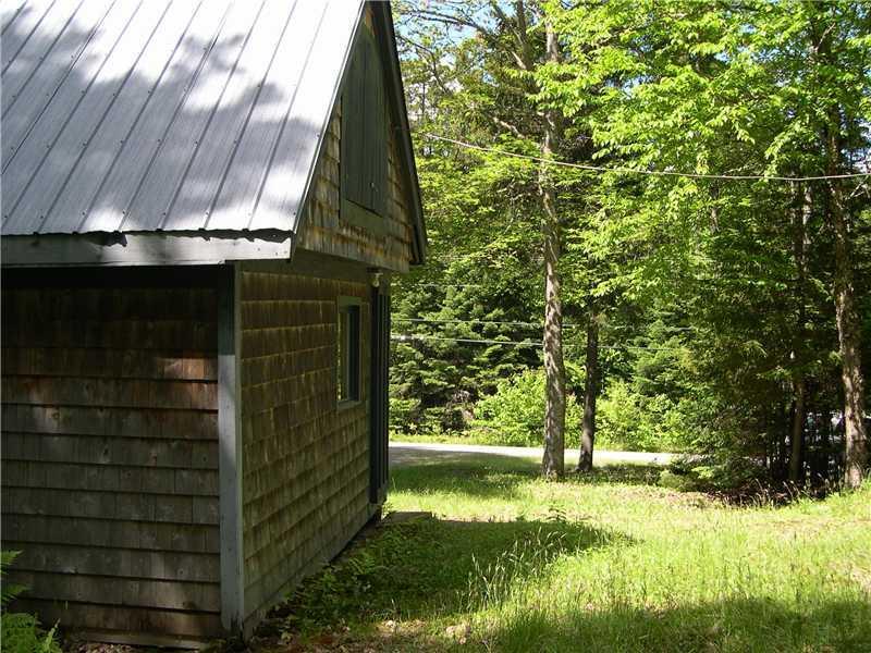 96 Bald Mountain Road Rangeley, ME 04964 - Photo 13 of 14 Exterior Front. Side of camp looking...
