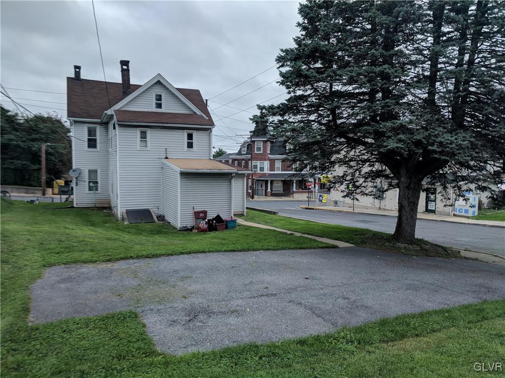 2 North 2nd Street Coplay, PA 18037 - Photo 13 of 14 a front view of a house with a yard
