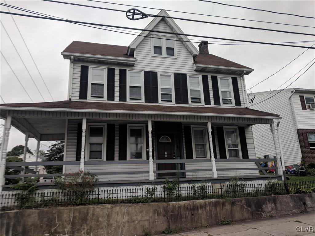 2 North 2nd Street Coplay, PA 18037 - Photo 14 of 14 a view of a white house with large windows