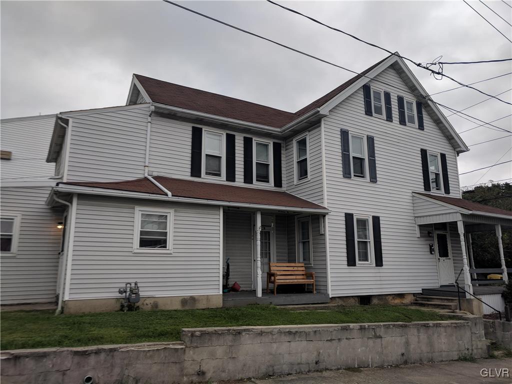 2 North 2nd Street Coplay, PA 18037 - Photo 2 of 14 a front view of a house with a yard