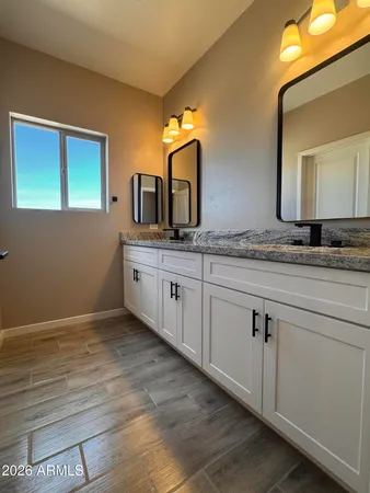 a view of a backyard of the house