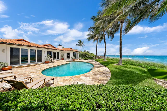 a view of a hallway with seating area