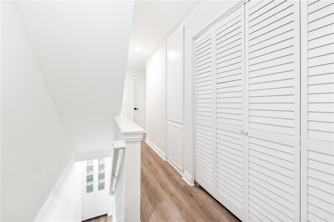 423 18th Street Huntington Beach, CA 92648 - Photo 19 of 67 a view of a hallway with windows