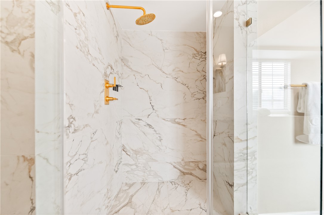 423 18th Street Huntington Beach, CA 92648 - Photo 28 of 67 a bathroom with a shower