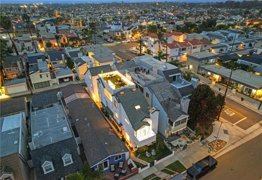 423 18th Street Huntington Beach, CA 92648 - Photo 58 of 67 an aerial view of a city with lots of residential buildings