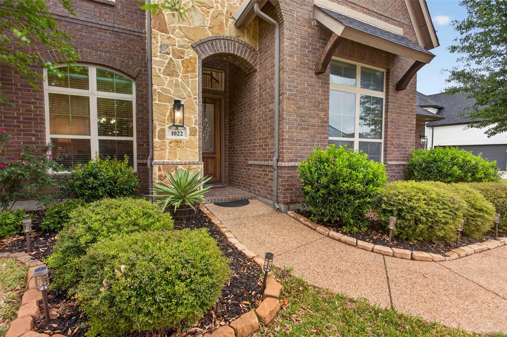 1022 Longhill Way Forney, TX 75126 - Photo 22 of 29 a front view of a house with a garden