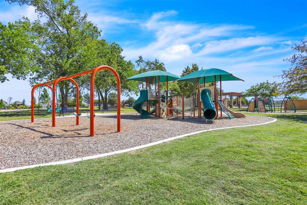 1022 Longhill Way Forney, TX 75126 - Photo 25 of 29 a view of outdoor space with playground and green space