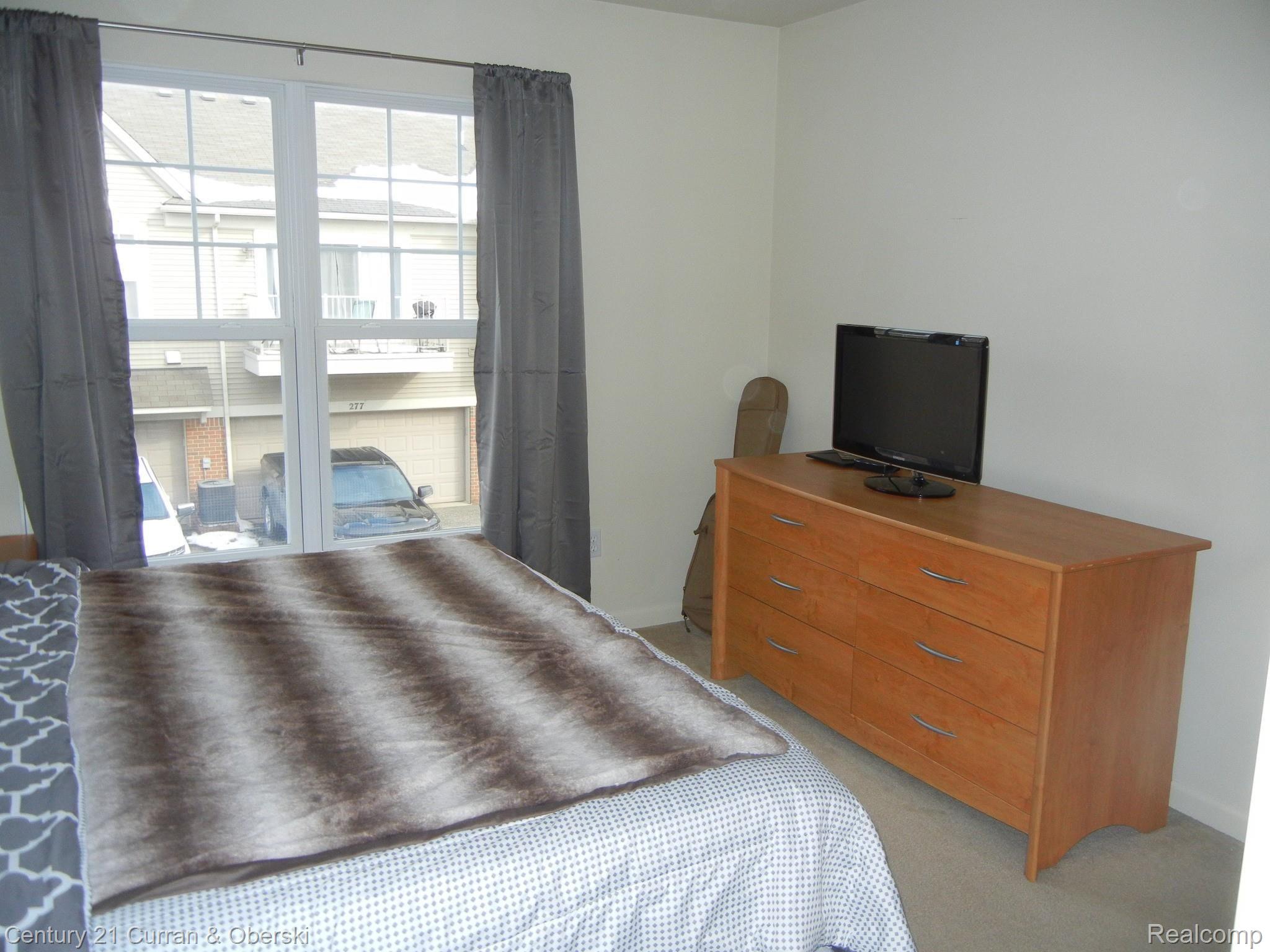 270 North Wixom Road, Unit 60 Wixom, MI 48393 - Photo 16 of 26 Master Bedroom