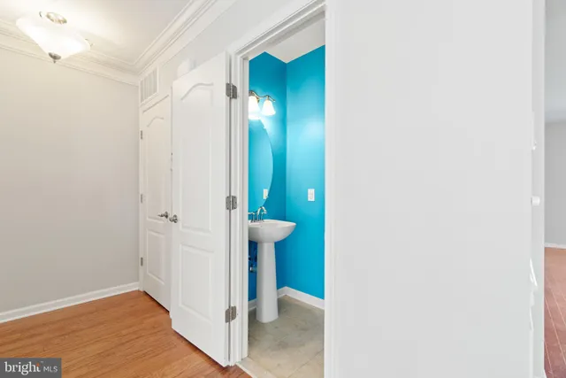 a view of a hallway with an door