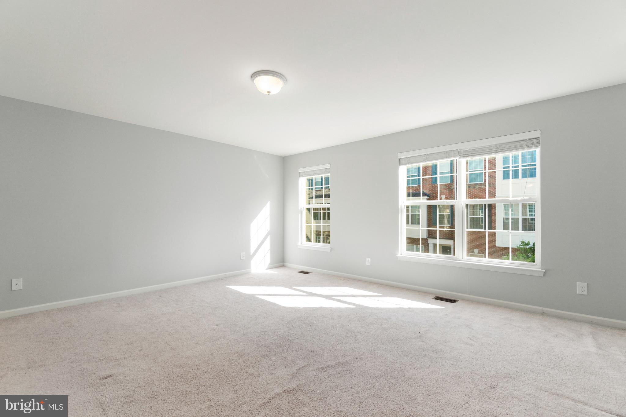 2261 Kew Gardens Drive, Unit 186 Woodbridge, VA 22191 - Photo 16 of 32 an empty room with a window