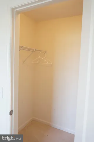 a view of room with air conditioner duct and materials on floor