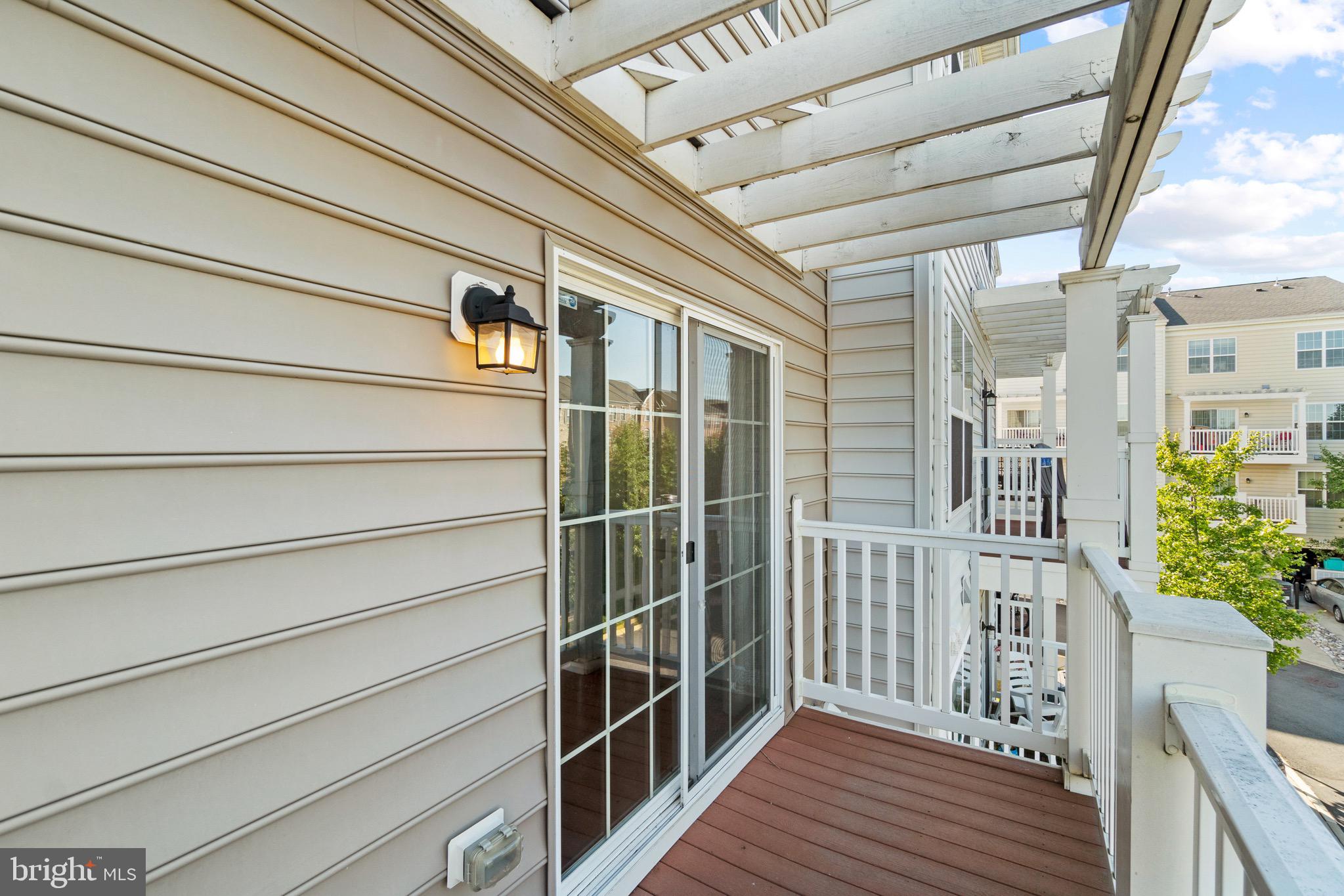 2261 Kew Gardens Drive, Unit 186 Woodbridge, VA 22191 - Photo 6 of 32 a view of a balcony with wooden floor