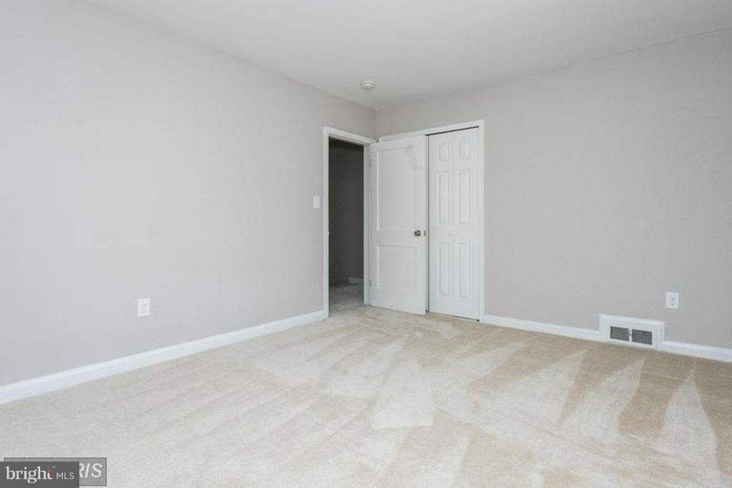 1239 Cedarcroft Road Baltimore, MD 21239 - Photo 12 of 16 a view of an empty room