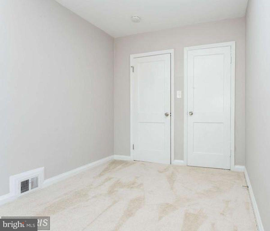 1239 Cedarcroft Road Baltimore, MD 21239 - Photo 13 of 16 a view of an empty room