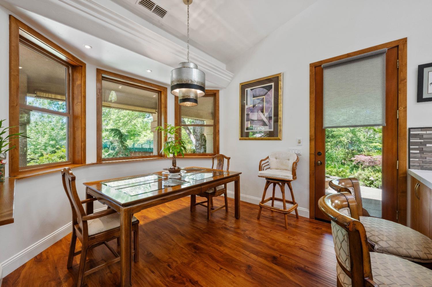 7730 Suzuki Lane Loomis, CA 95650 - Photo 14 of 62 a dining room with furniture window wooden floor