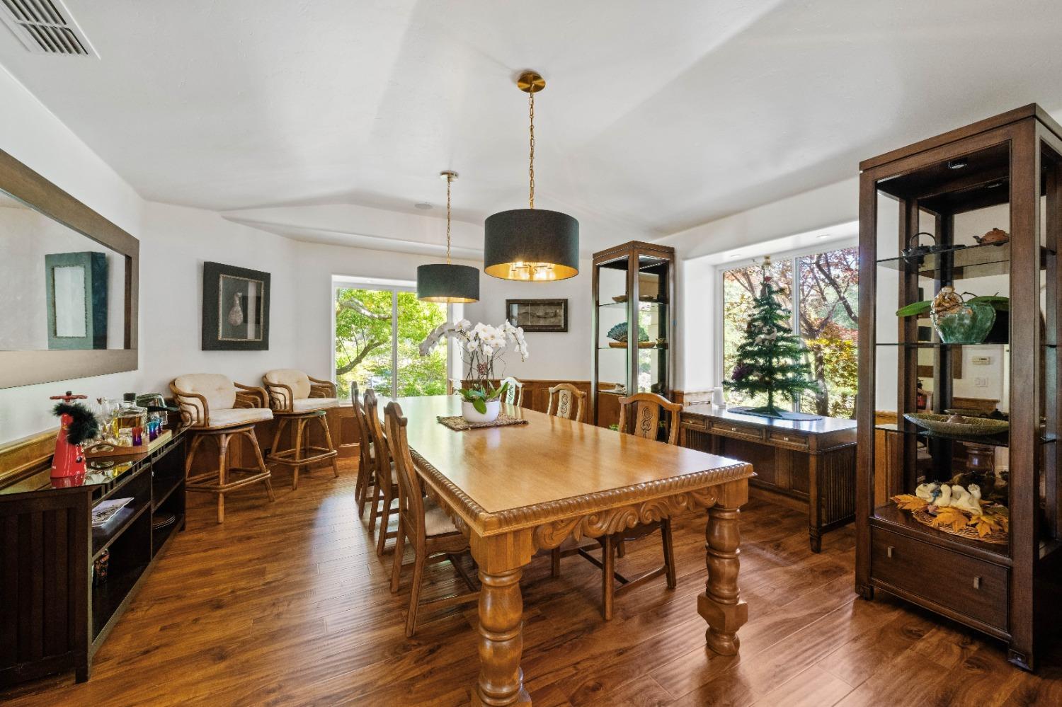 7730 Suzuki Lane Loomis, CA 95650 - Photo 17 of 62 a view of a dining room with furniture window and wooden floor