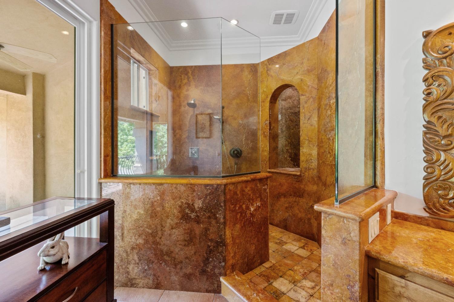 7730 Suzuki Lane Loomis, CA 95650 - Photo 24 of 62 a bathroom with a granite countertop sink and a mirror