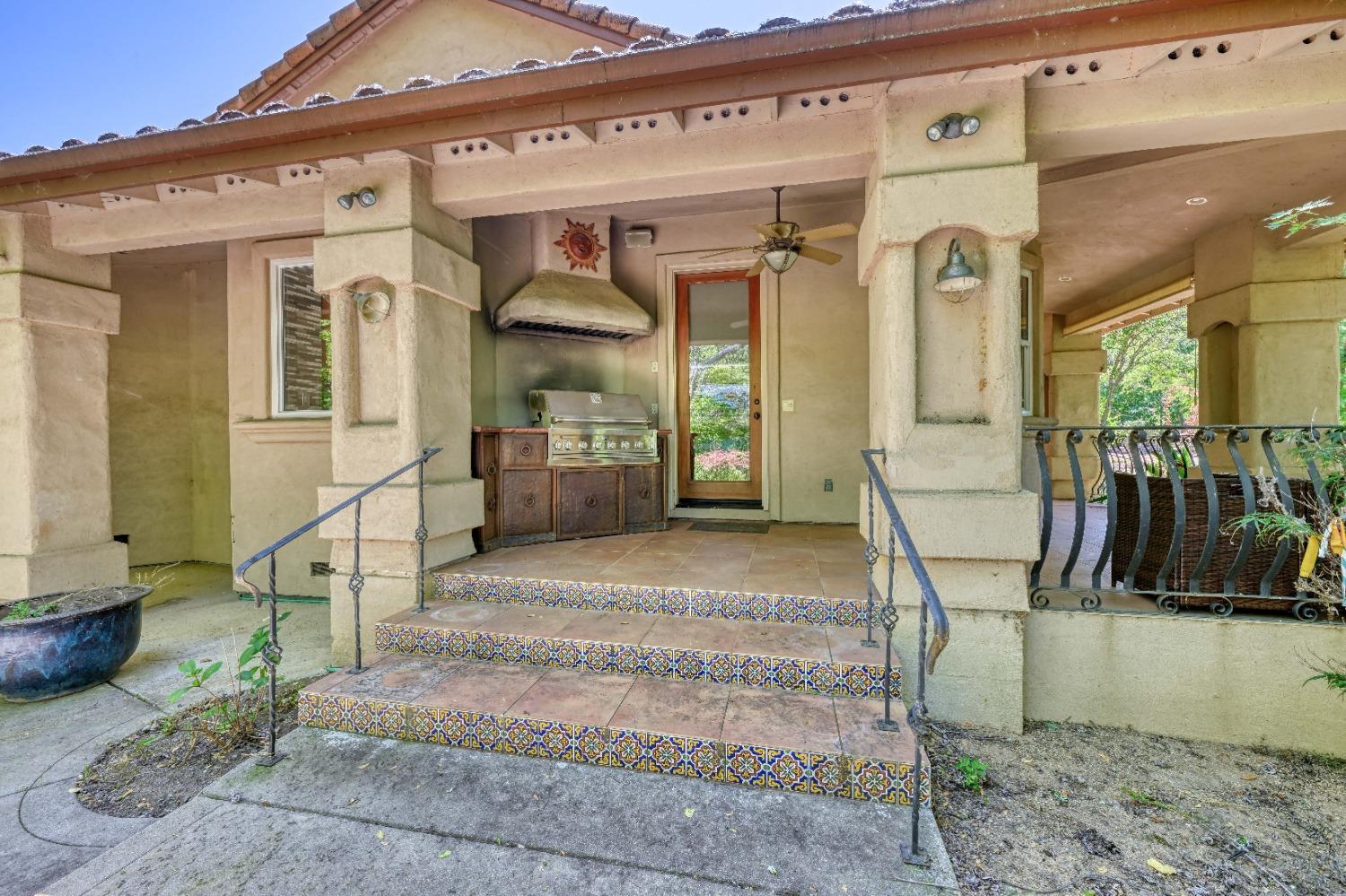 7730 Suzuki Lane Loomis, CA 95650 - Photo 31 of 62 a view of a building with a porch