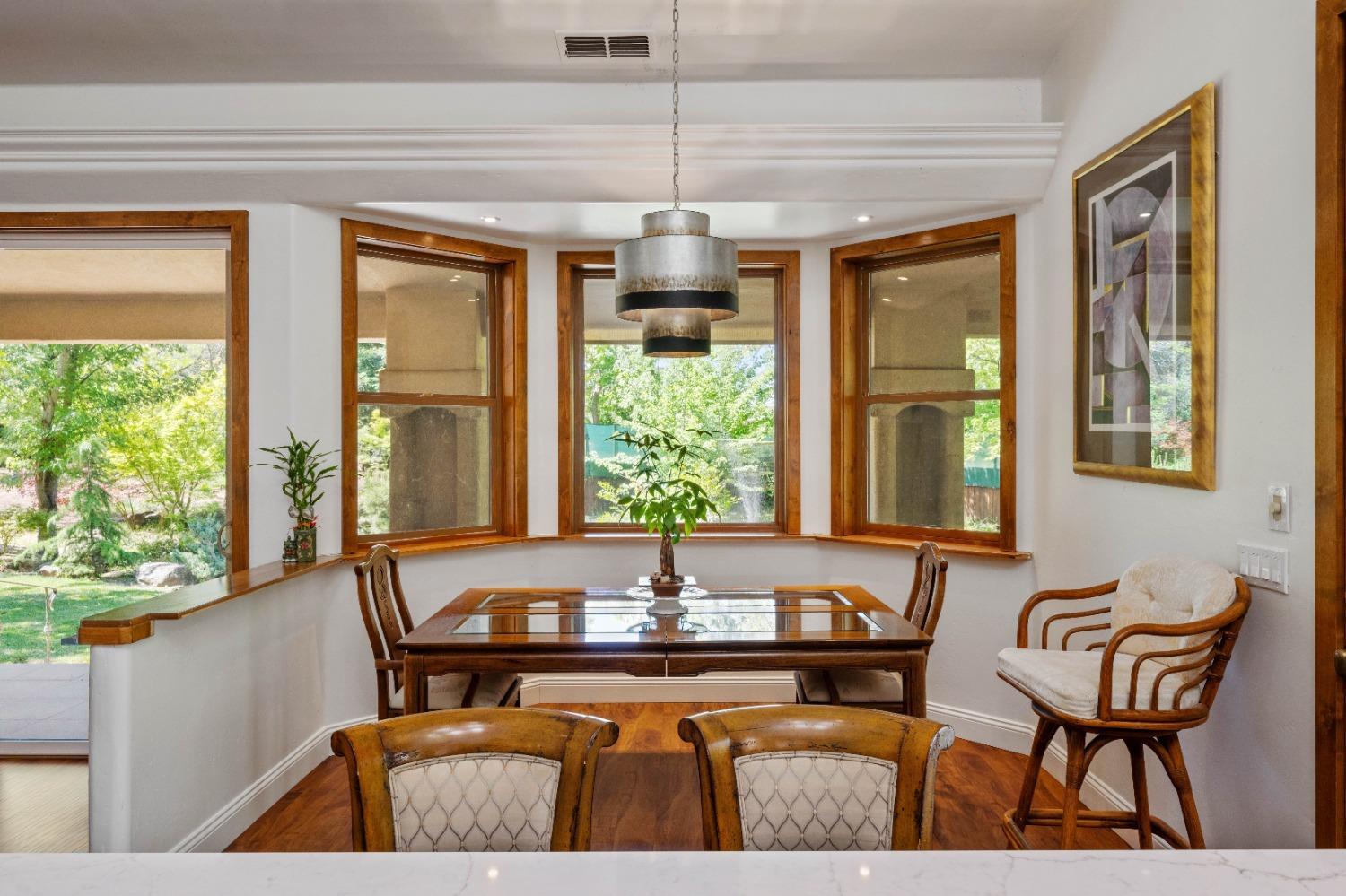 7730 Suzuki Lane Loomis, CA 95650 - Photo 36 of 62 a view of a dining room with furniture window and outside view