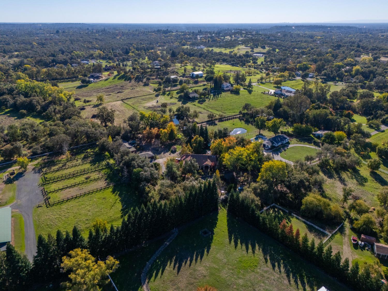 7730 Suzuki Lane Loomis, CA 95650 - Photo 59 of 62 a view of a lake with a mountain in the background