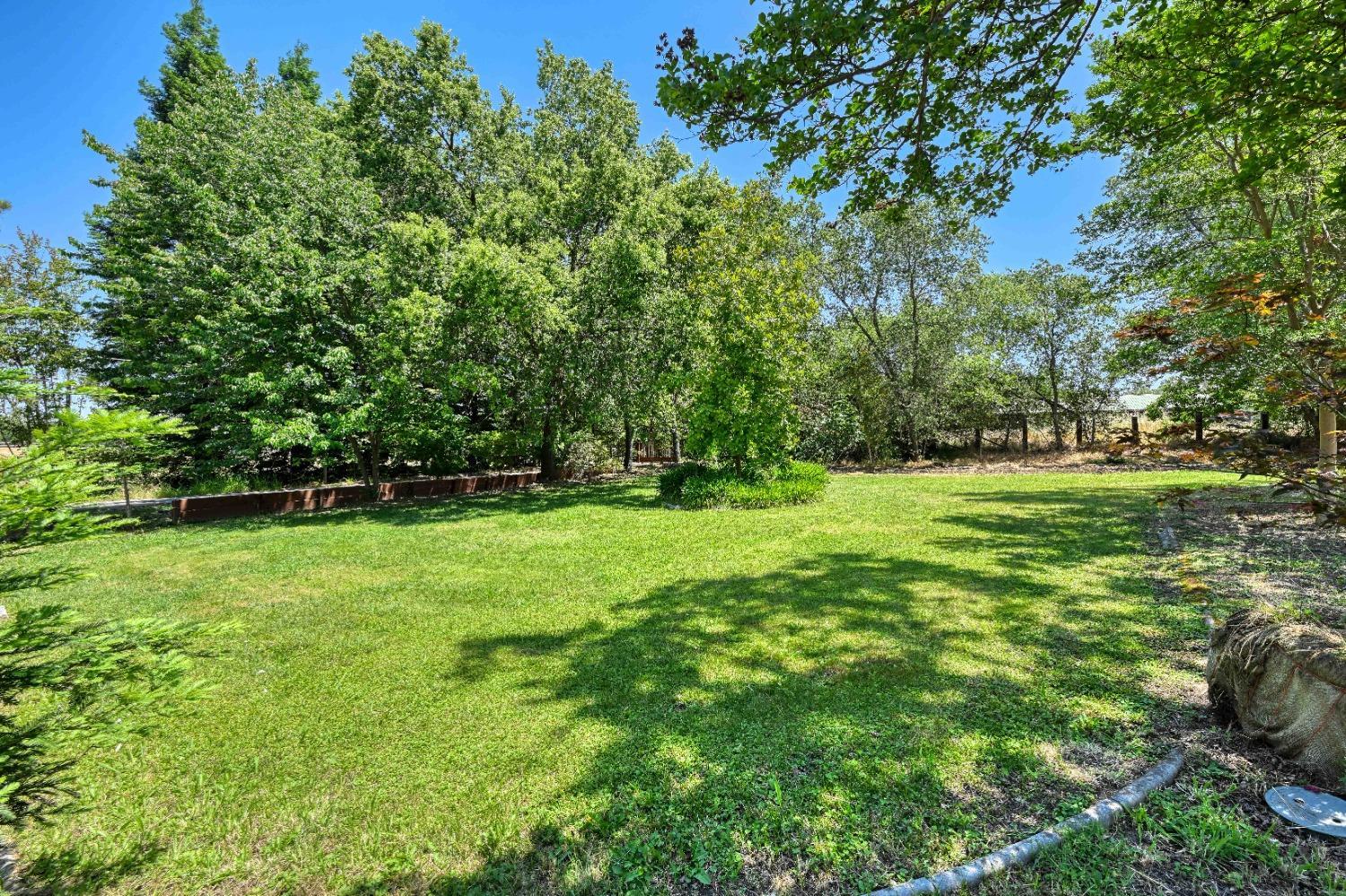 7730 Suzuki Lane Loomis, CA 95650 - Photo 9 of 62 a view of outdoor space with deck and yard
