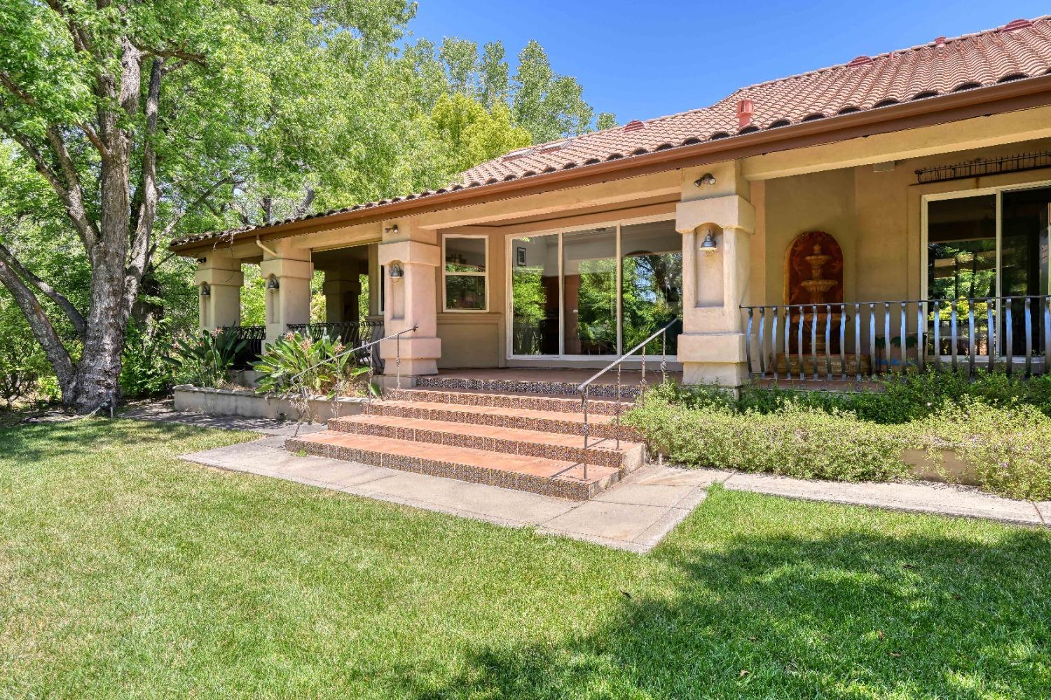 7730 Suzuki Lane Loomis, CA 95650 - Photo 10 of 62 front view of a house with a yard