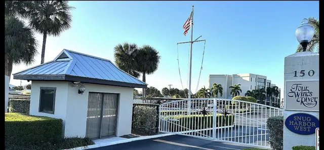 a view of a balcony and a potted plant