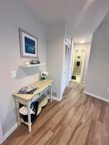 a room with furniture and a wooden floor