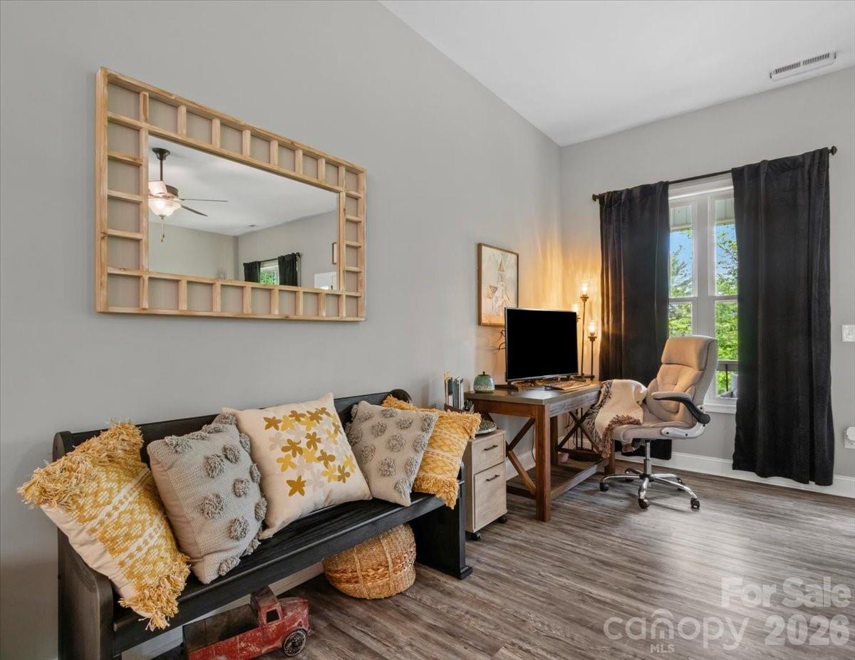 36 Cherry Ridge Lane Weaverville, NC 28787 - Photo 5 of 37 a living room with furniture and a flat screen tv