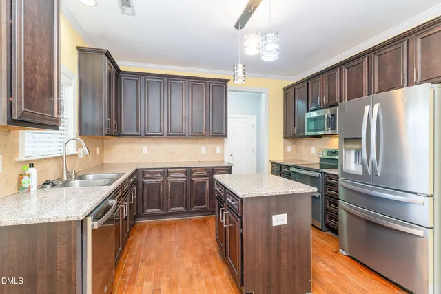 a view of a dining room with furniture