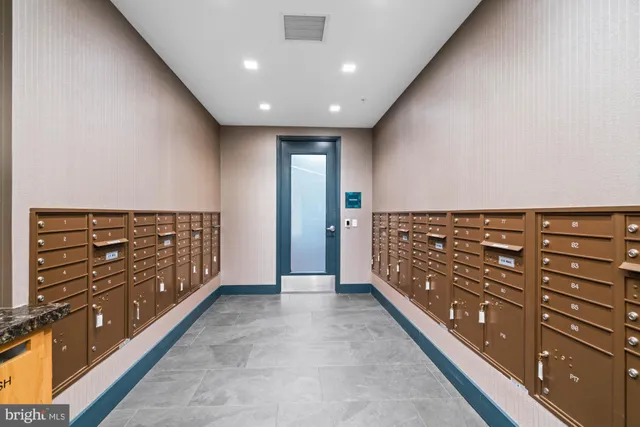 a view of parking garage with cars parked
