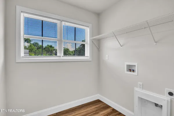 a view of a room that has a window in it