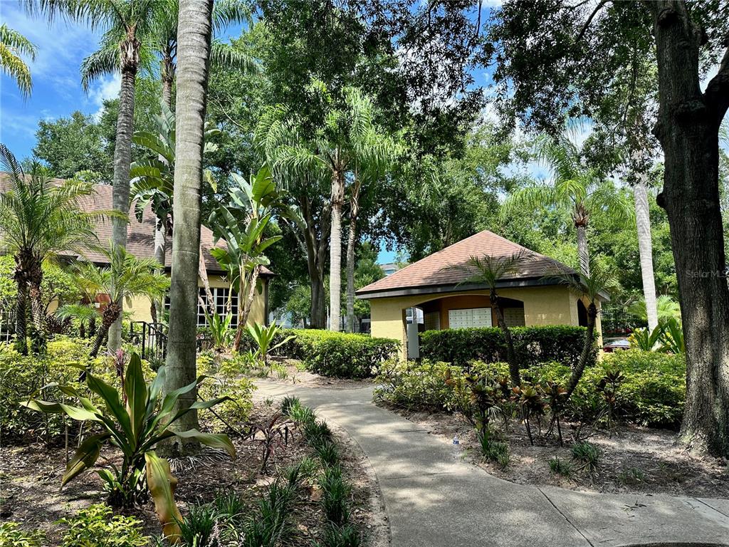6304 Raleigh Street, Unit 202 Orlando, FL 32835 - Photo 15 of 15 a view of a garden