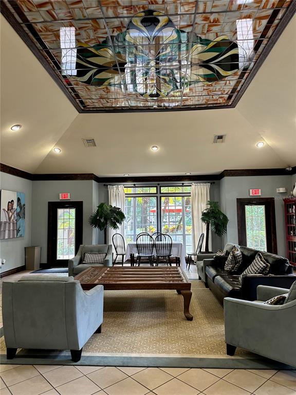 6304 Raleigh Street, Unit 202 Orlando, FL 32835 - Photo 10 of 15 a living room with furniture