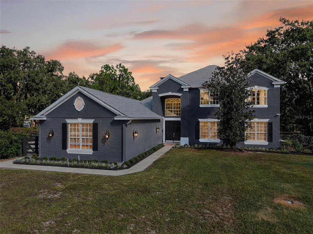 a house view with a garden space