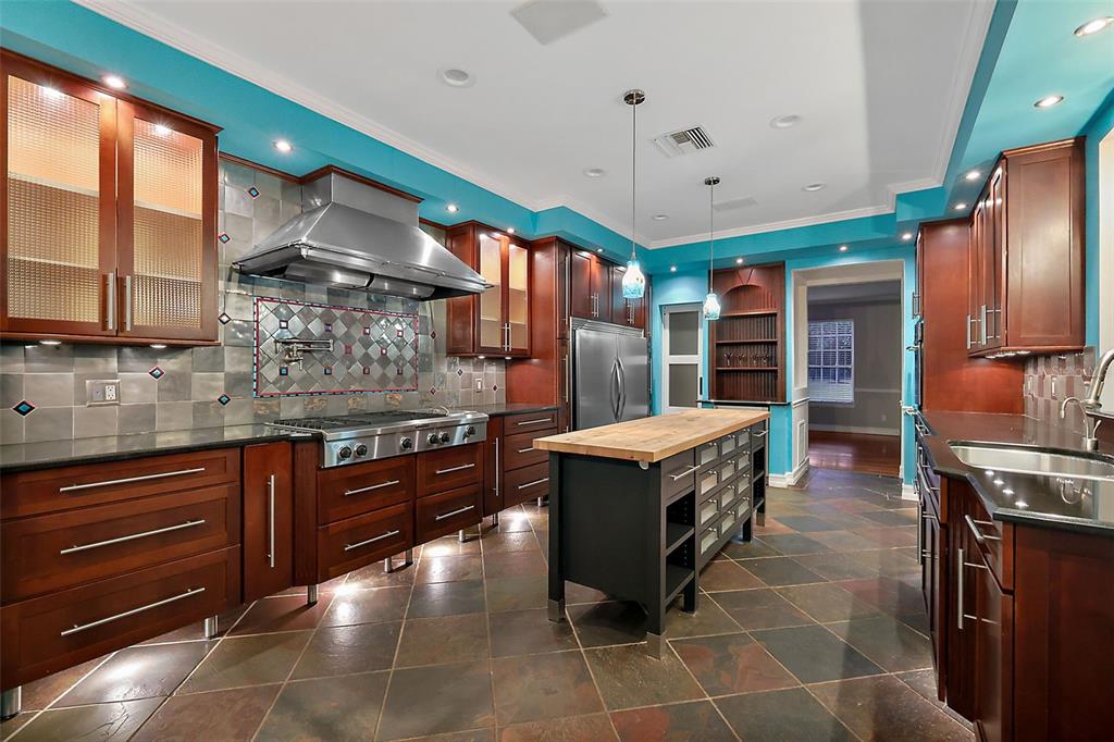 28004 Shirley Shores Road Tavares, FL 32778 - Photo 18 of 68 a kitchen with stainless steel appliances granite countertop a stove a sink and a refrigerator