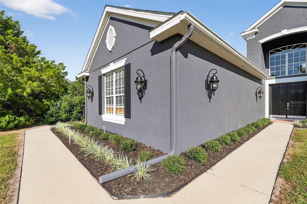 28004 Shirley Shores Road Tavares, FL 32778 - Photo 4 of 68 a house view with a backyard space