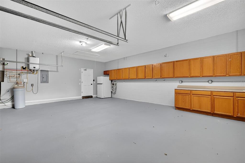 28004 Shirley Shores Road Tavares, FL 32778 - Photo 48 of 68 a view of a kitchen with storage and utility