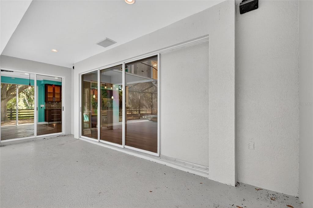 28004 Shirley Shores Road Tavares, FL 32778 - Photo 50 of 68 en empty room with windows and closet