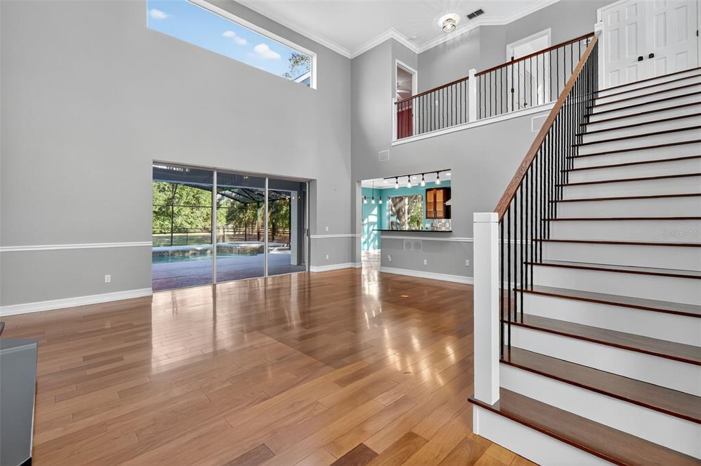 28004 Shirley Shores Road Tavares, FL 32778 - Photo 10 of 68 a view of entryway and hall with wooden floor