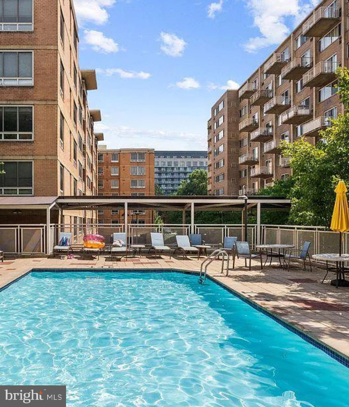 800 4th Street Southwest, Unit N103 Washington, DC 20024 - Photo 30 of 56 a view of a house with a yard and sitting area