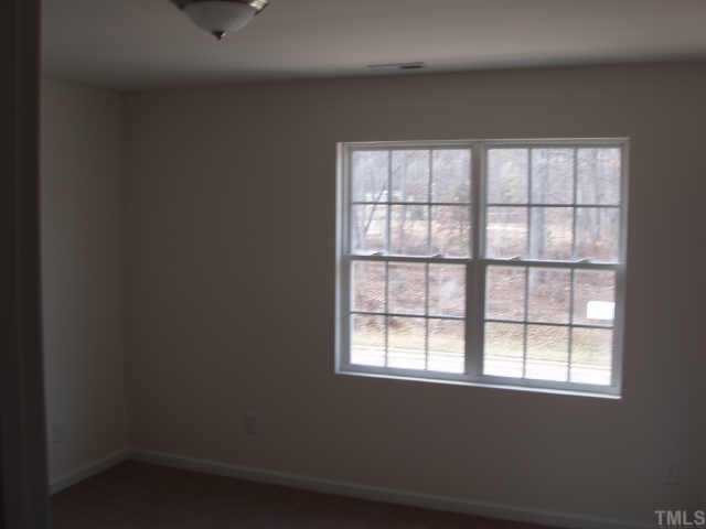 844 Horton Road, Unit 77 Durham, NC 27704 - Photo 6 of 11 Small view of master bedroom. Good size with nice window for natural light. En suite master bath. Other