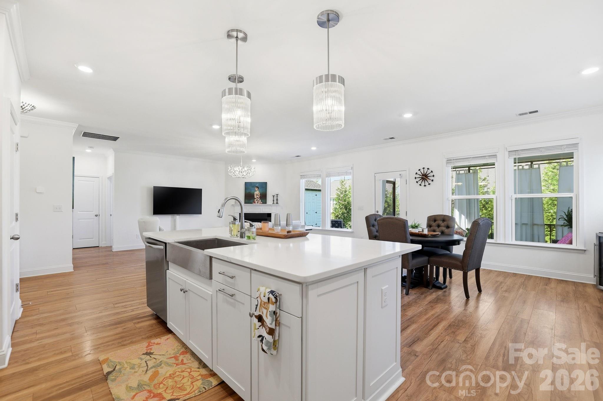 6038 Holland Street Fort Mill, SC 29707 - Photo 12 of 48 a large kitchen with a table and chairs