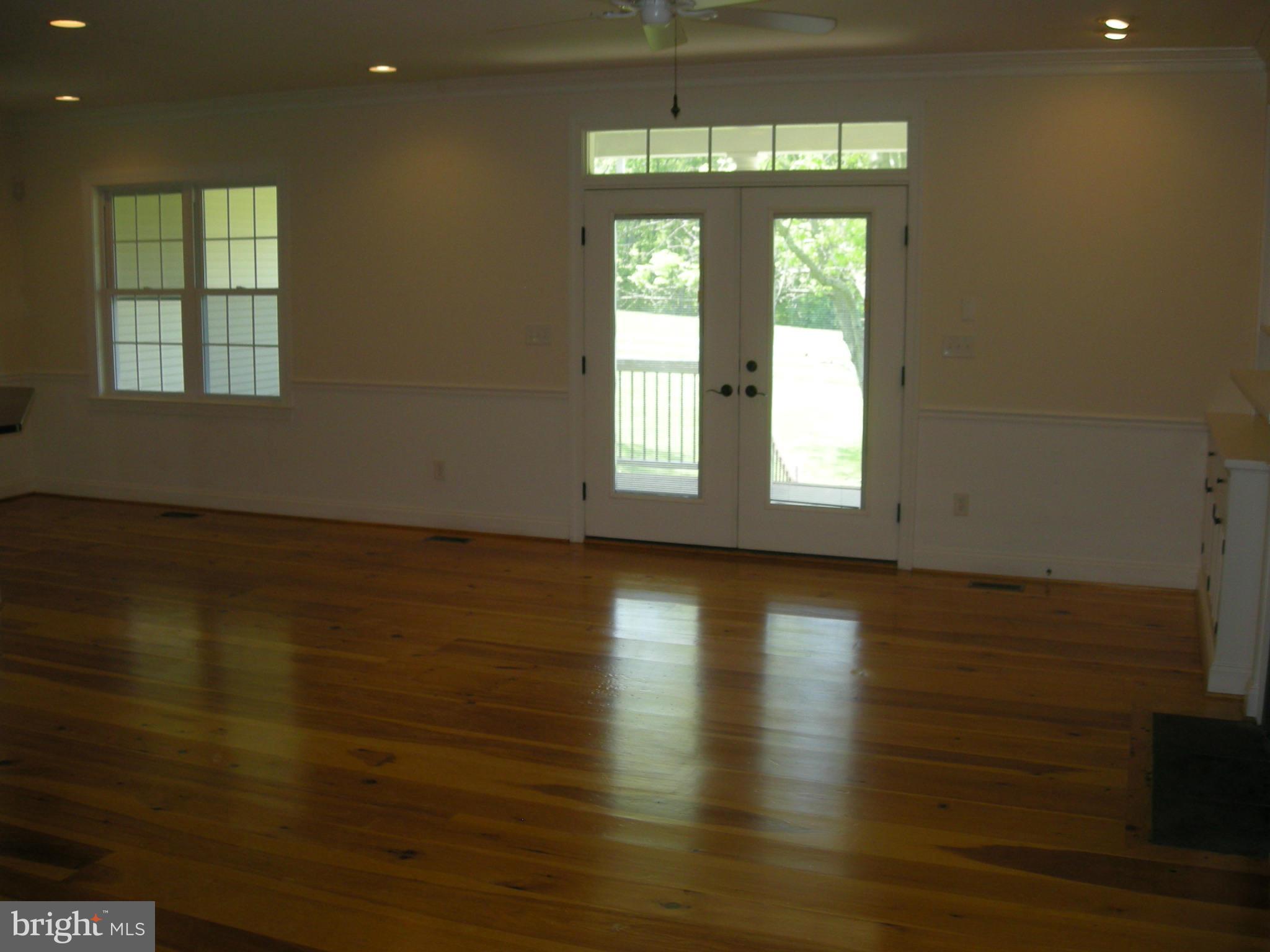 3903 Eland Road Phoenix, MD 21131 - Photo 16 of 29 Family Room w/french door to deck