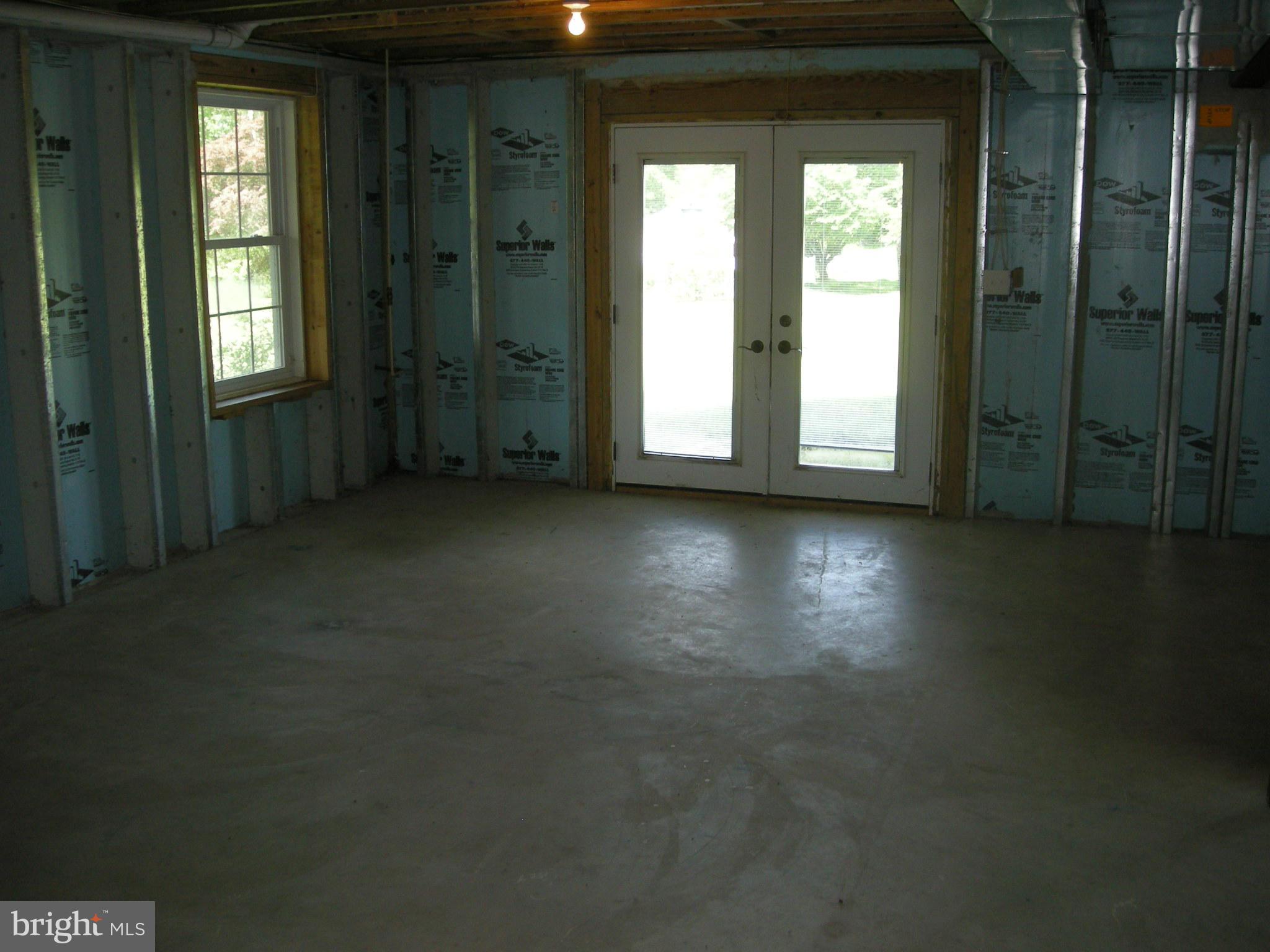 3903 Eland Road Phoenix, MD 21131 - Photo 25 of 29 French doors to the yard from the basement