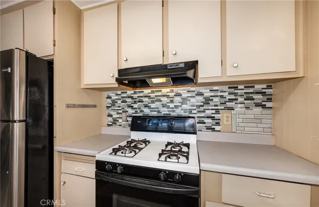 a view of a storage & utility room with a window