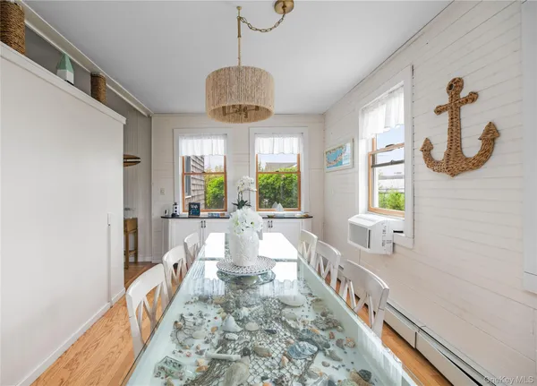 a kitchen with a sink cabinets and window