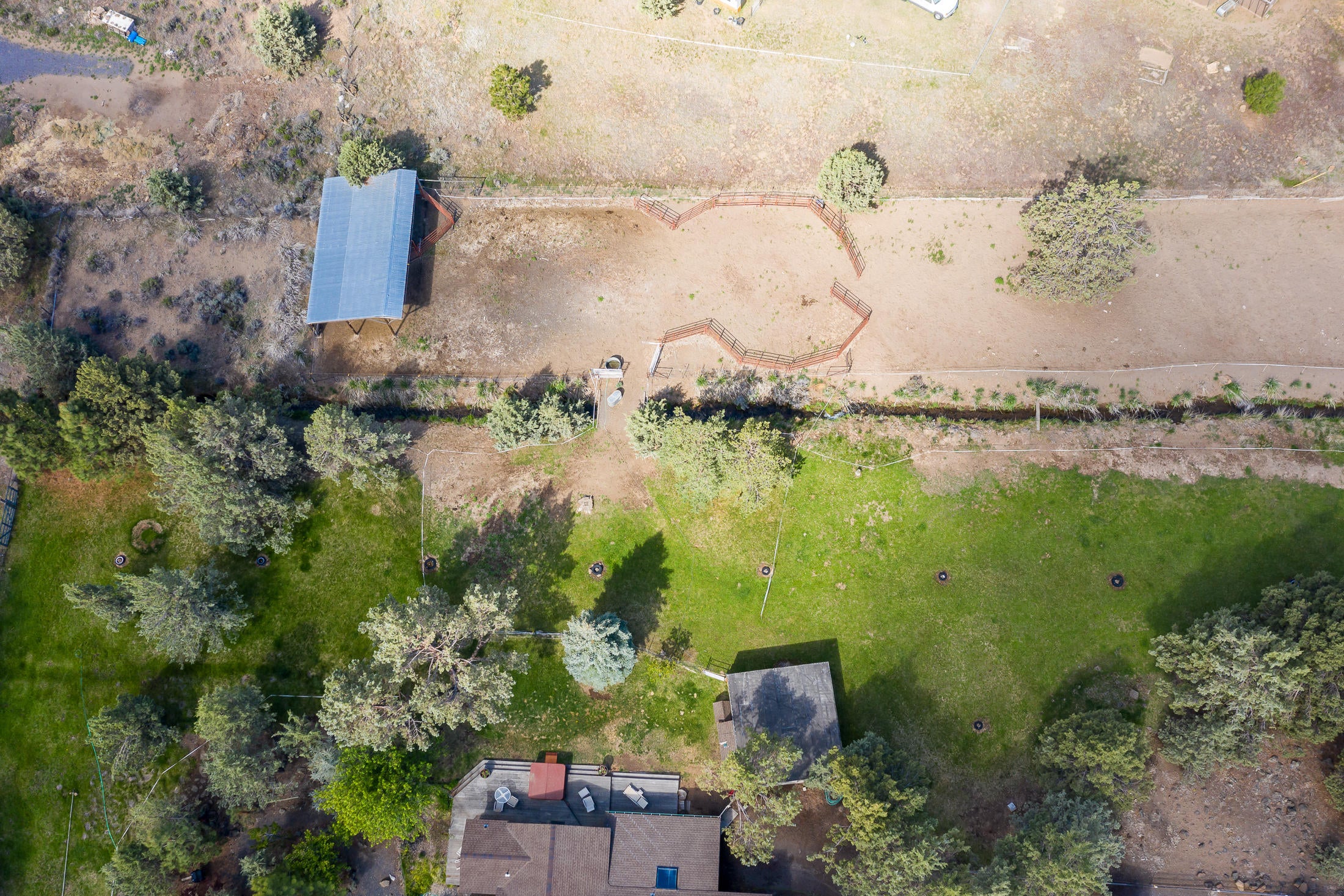 61255 Ward Road Bend, OR 97702 - Photo 56 of 63 40 X 20 2-sided Pole Barn upper left